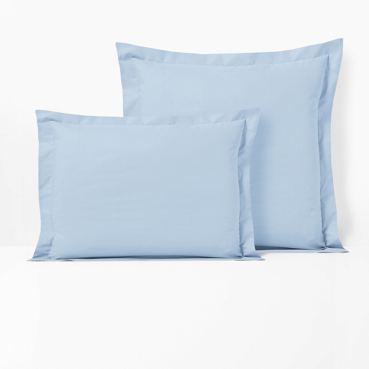 Μονόχρωμη βαμβακερή μαξιλαροθήκη με επίπεδο βολάν 50x70 cm