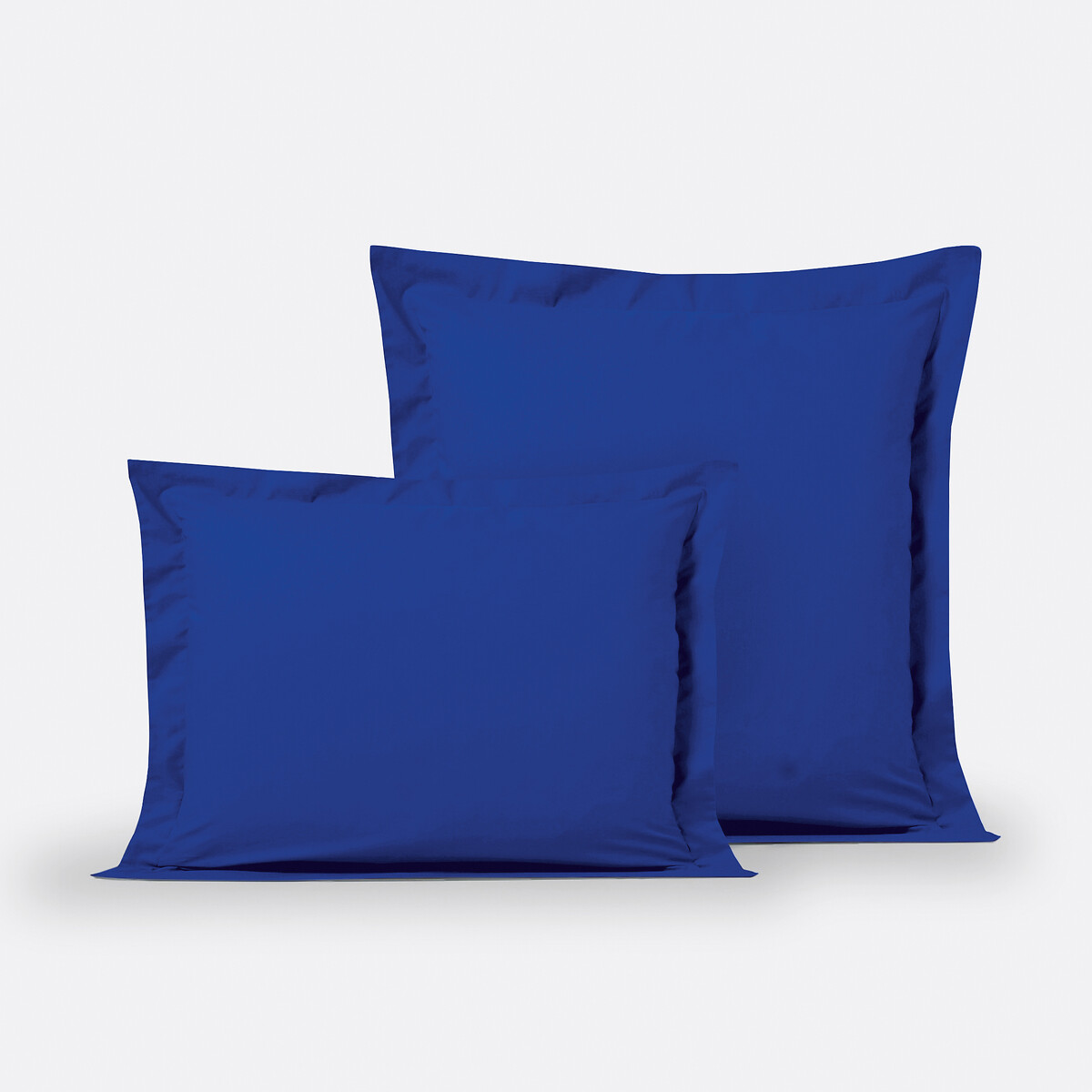 Μονόχρωμη βαμβακερή μαξιλαροθήκη με επίπεδο βολάν 50x70 cm