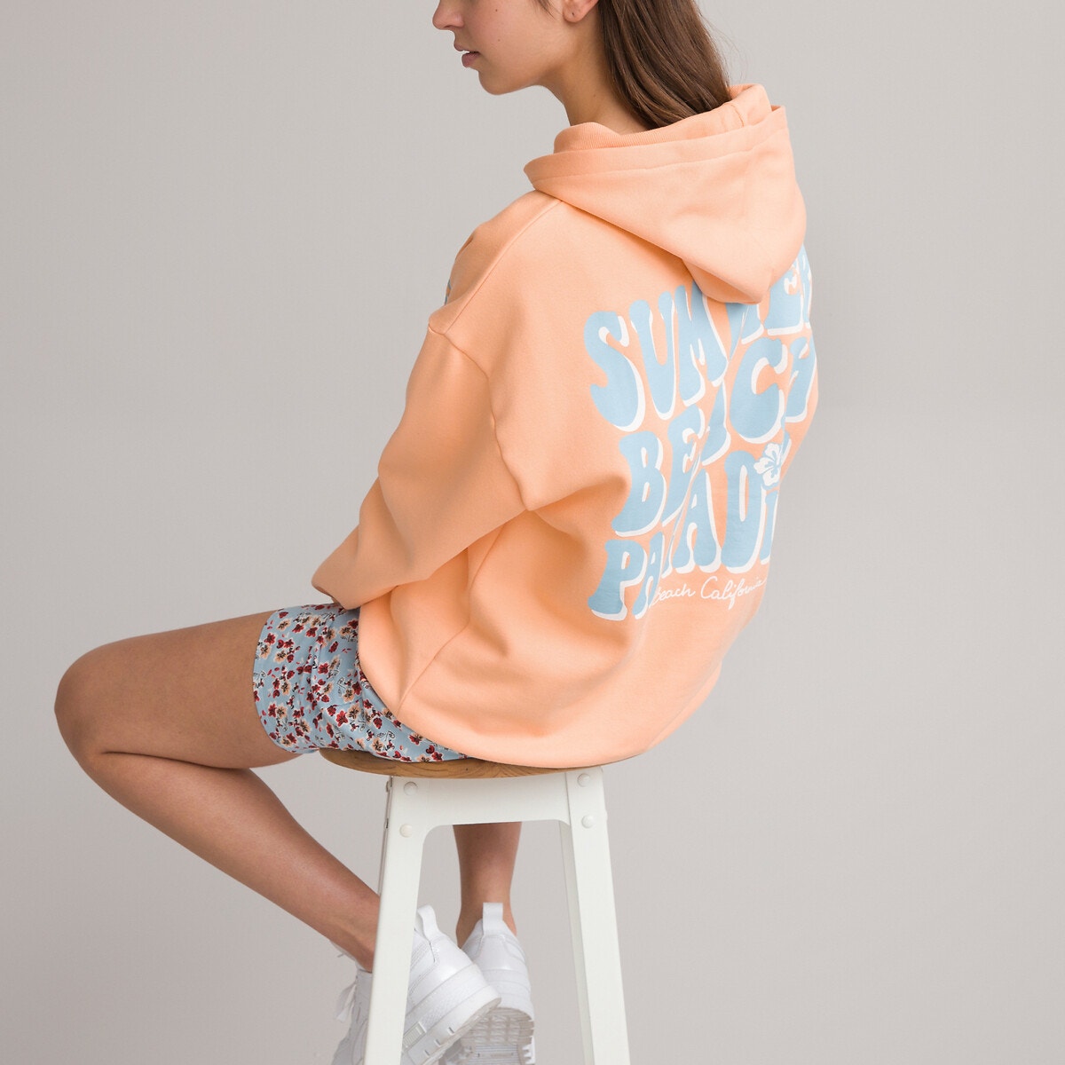 Φαρδύ φανελένιο φούτερ με κουκούλα και μοτίβο στην πλάτη