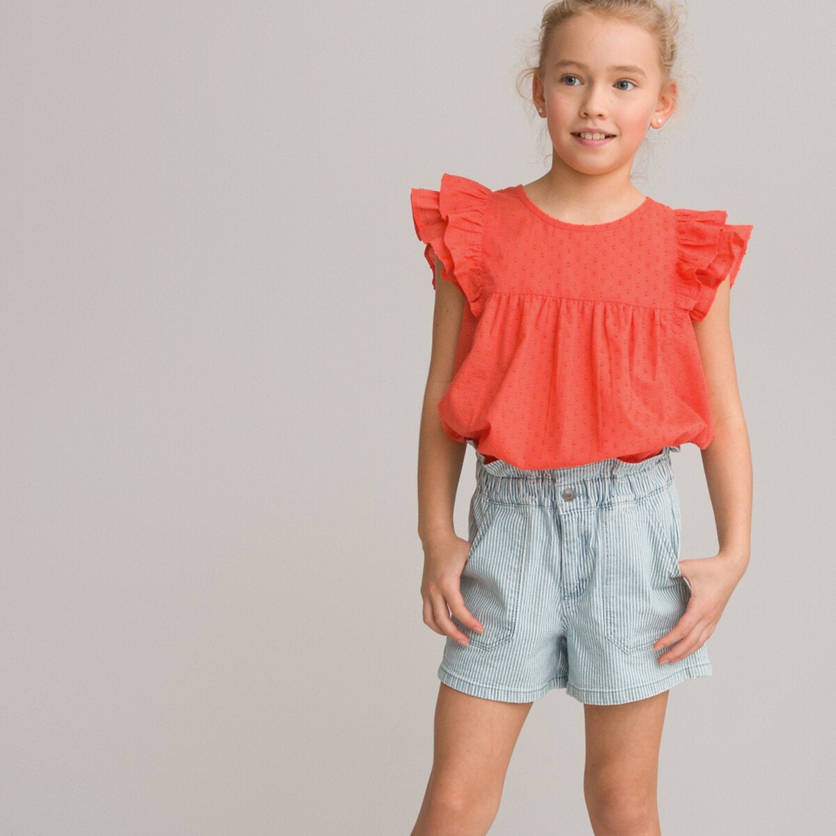 Μπλούζα με βολάν και ανάγλυφα πουά