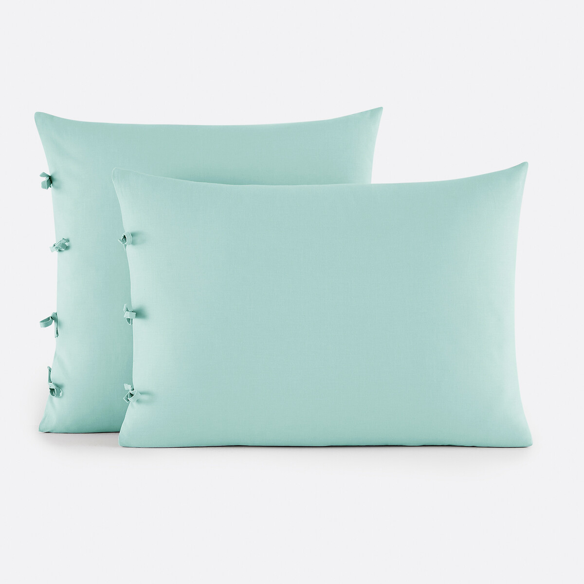 Βαμβακερή μονόχρωμη μαξιλαροθήκη με φιογκάκια 50x70 cm